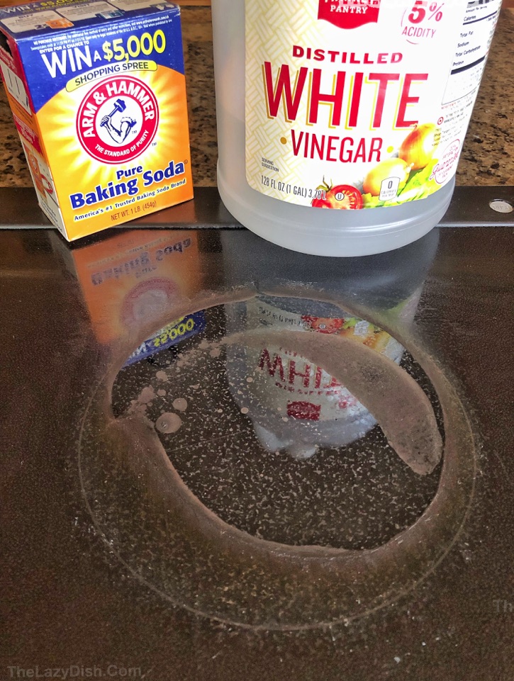 clean glass stove top with baking soda and vinegar