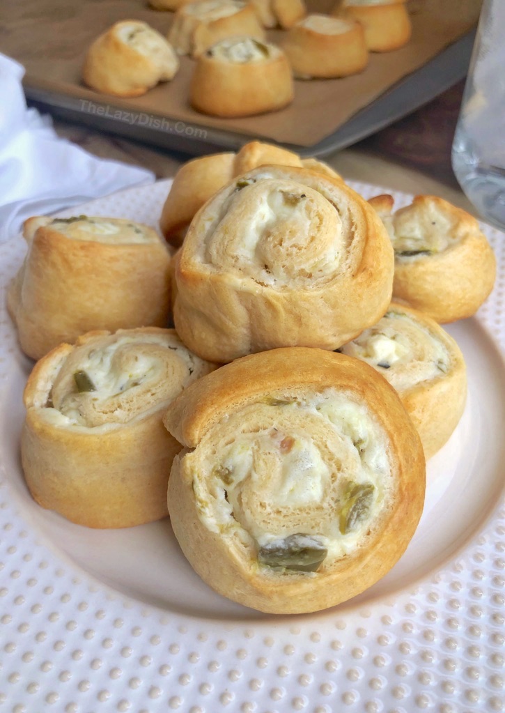 Jalapeño Cream Cheese Pinwheels - Quick and easy appetizers for a party! A sweet and spicy snack idea everyone will love. Made with just 4 simple ingredients! The Lazy Dish #thelazydish #gameday #appetizers #pinwheels #funsnacks #lazyfood
