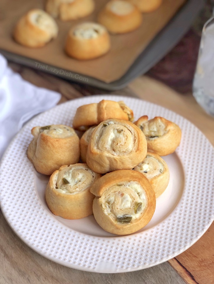 Jalapeño Cream Cheese Pinwheels Recipe - Quick and easy appetizers for a party! A sweet and spicy snack idea everyone will love. Made with just 4 simple ingredients! The Lazy Dish #thelazydish #gameday #appetizers #pinwheels #funsnacks #lazyfood