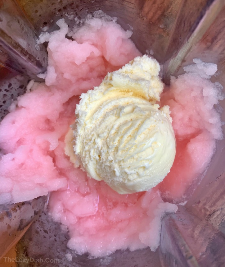 Frosted Raspberry Lemonade Recipe made with just 3 ingredients! A super quick and easy summer slushie recipe even kids can make in the blender.