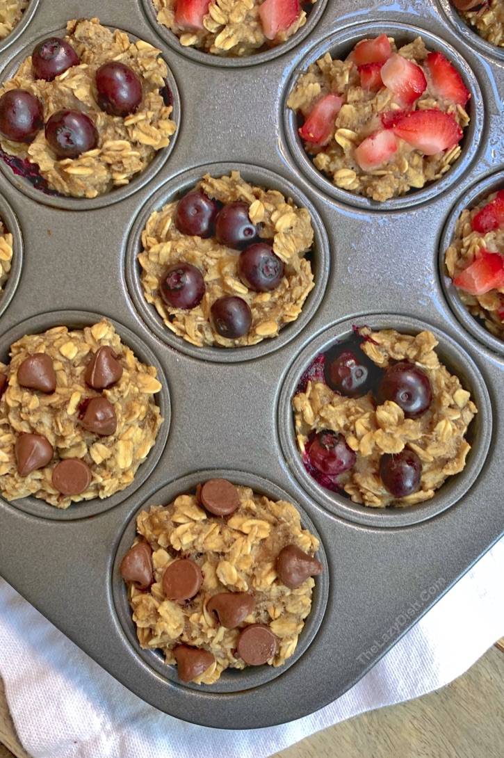 Healthy 3 Ingredient Banana Oat Muffins (plus the mix-ins of your choice) -- the perfect on the go snack idea for kids! Great for school lunch boxes. No sugar, no flour, no eggs and vegan friendly. Fast and simple to make. 