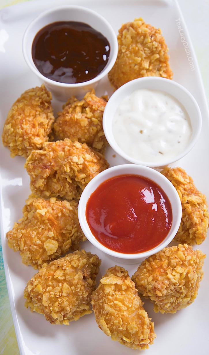 Baked Chicken Nuggets made with butter, eggs and Ritz crackers. Delish! A quick and easy boneless chicken dinner recipe the entire family will love!