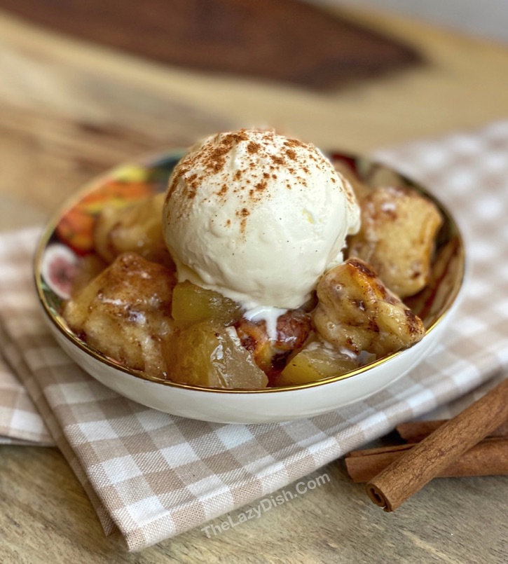 Quick and easy apple cobbler made with just 2 ingredients! This fall inspired dessert recipe is so simple to make! Homemade Cinnamon Roll Apple Cobbler 