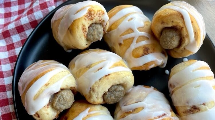 This fun and yummy breakfast is easy to make with just 2 ingredients! Pillsbury Cinnamon Rolls and frozen sausage links. Quick to bake for special occasion, birthdays, first day of school, sleepovers, and holidays.