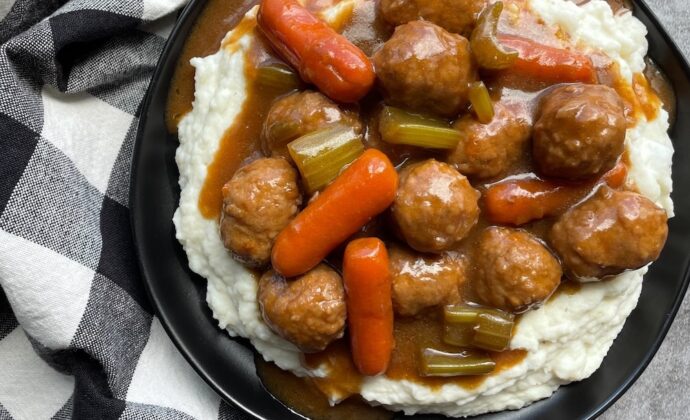 An easy slow cooker dinner recipe made with budget ingredients including frozen meatballs.