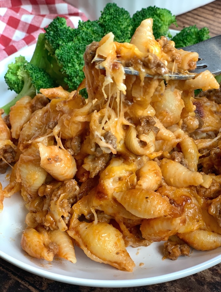 Cheeseburger pasta dinner served with broccoli for a yummy kid friendly weeknight meal. 