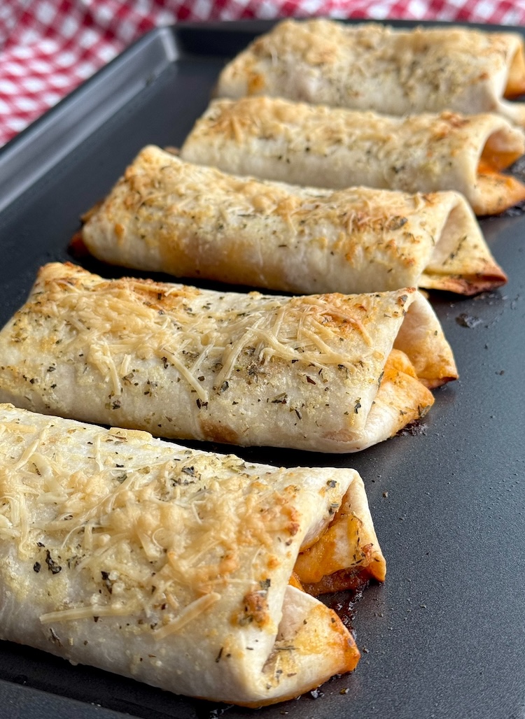 Just out of the oven! These pizza burritos are fun to make with simple ingredients and a family favorite dinner for busy weeknights. 