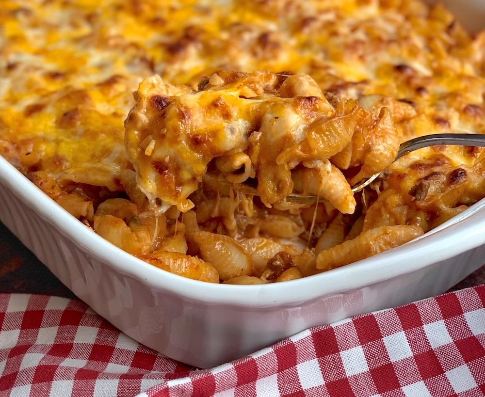 A family friendly dinner recipe that's quick and easy to make with just a few budget friendly ingredients including ground beef, pasta, cheese, and tomato soup.