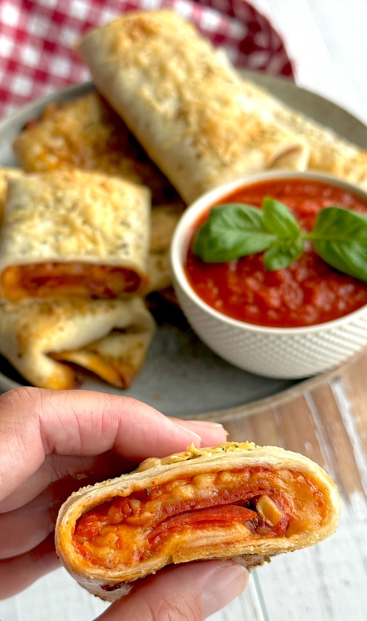 How to make pizza burritos for dinner! A fun, quick, and easy meal for your picky family. My kids love this simple oven baked for air fryer recipe. 